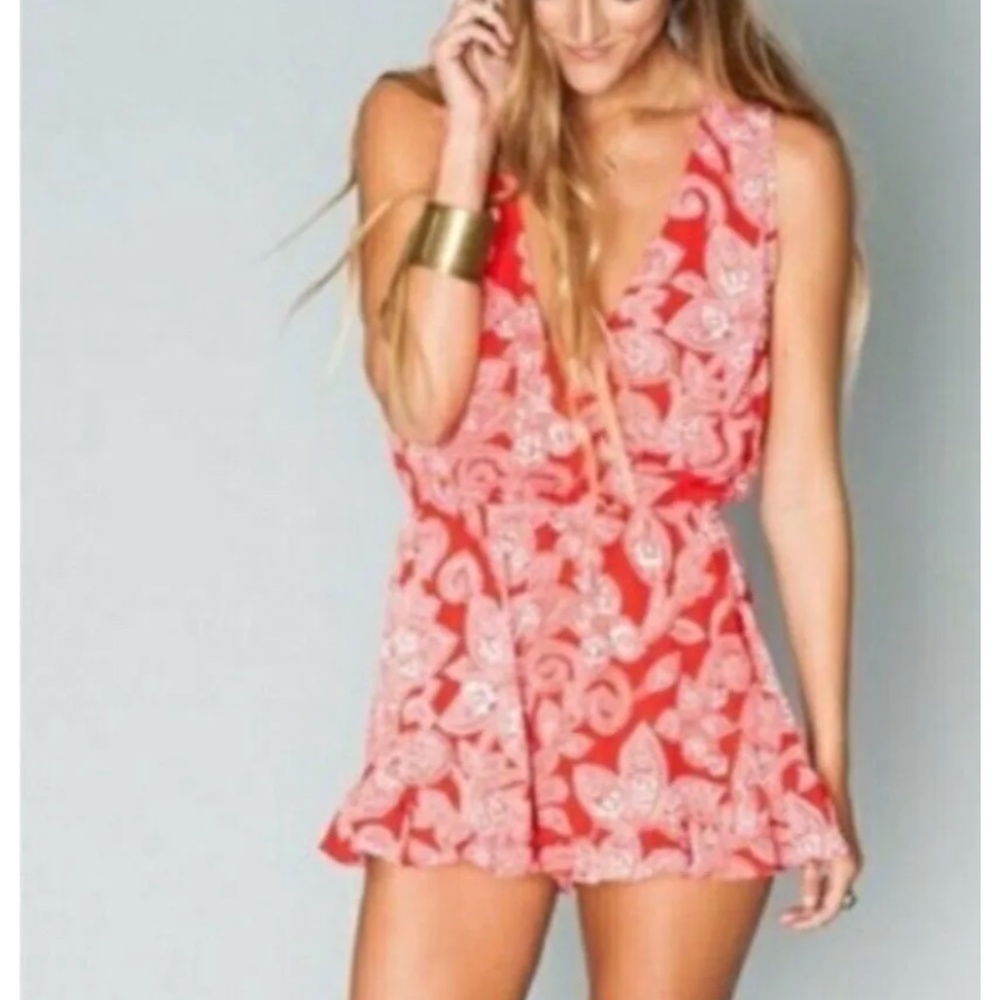Show me Your Mumu floral romper.‎ Worn about 2x . 98 retail